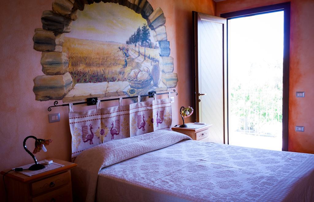 Agriturismo Le Vigne Ducali Mandas ภายนอก รูปภาพ
